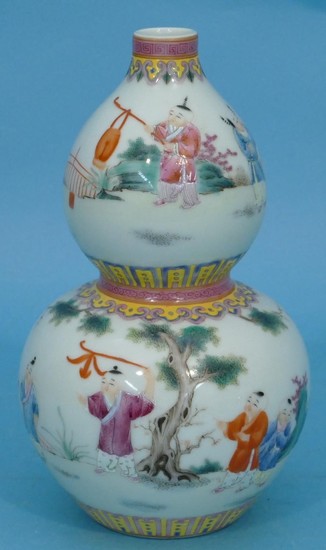 An Oriental Gourd Vase on white and pink ground having multi...