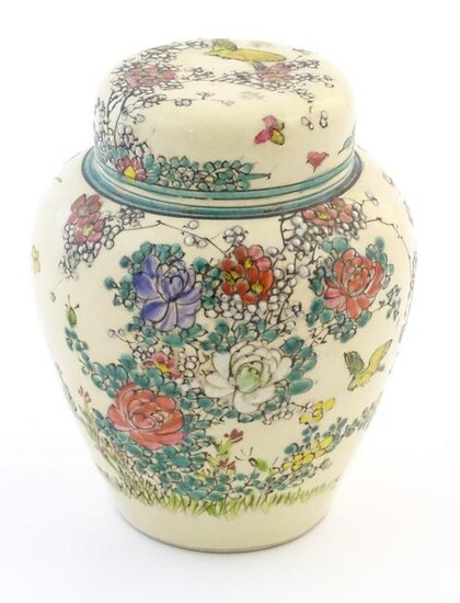 An Oriental ginger jar and cover with inner lid