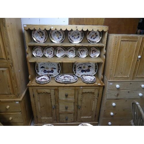 An antique pine Kitchen Dresser, with an open plate rack, co...