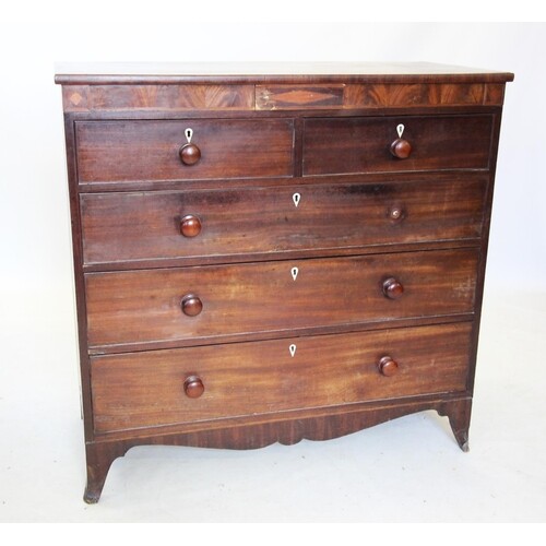 An early 19th century mahogany chest of drawers, with a sing...