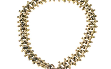 An early 20th century 9ct gold fancy-link charm bracelet, with heart-shaped padlock clasp.