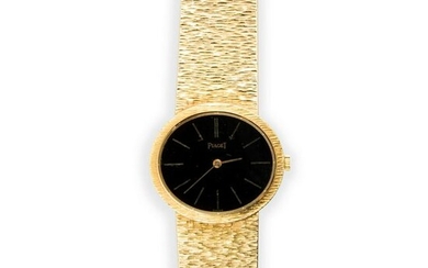 An eighteen karat gold bracelet watch, Piaget