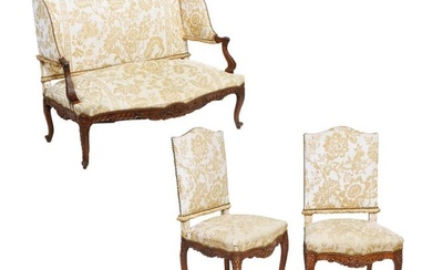 Antique French Louis XV Style Carved Walnut Three Piece Parlor Suite, 19th c., including a settee