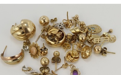 Assortment of yellow gold (tests 9ct) odd earrings, stones i...