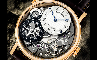 BREGUET. AN 18K PINK GOLD SEMI-SKELETONISED DUAL TIME WRISTWATCH WITH DAY/NIGHT INDICATION TRADITION MODEL, REF. 7067