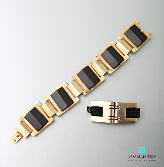 Bracelet articulé en laiton orné de motifs... - Lot 230 - Vasari Auction