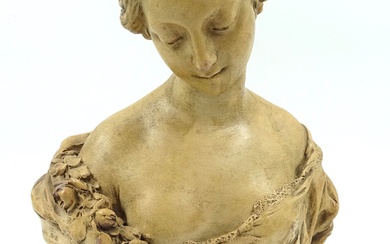 Buste de jeune femme en fleurs. Epreuve en terre cuite, socle marbre. H: 35 cm....