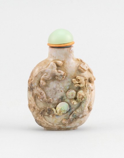 CHINESE OPALESCENT HARDSTONE SNUFF BOTTLE In spade shape, carved with two qilins chasing a fiery opal pearl. Height 2.5". Replacemen...