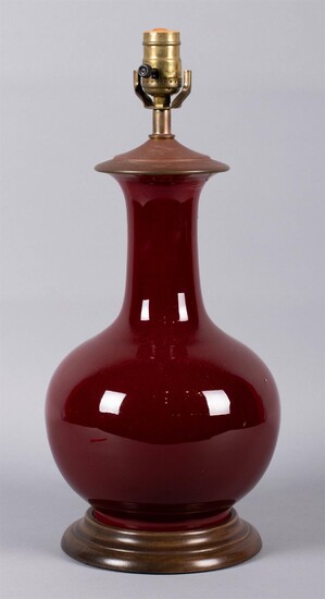 CHINESE SANG-DE-BOUEF-GLAZED TEARDROP VASE, NOW MOUNTED AS A TABLE LAMP, LATE 19TH CENTURY
