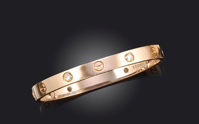 Cartier, un bracelet en diamant 'LOVE', serti de quatre diamants ronds de taille brillant en...