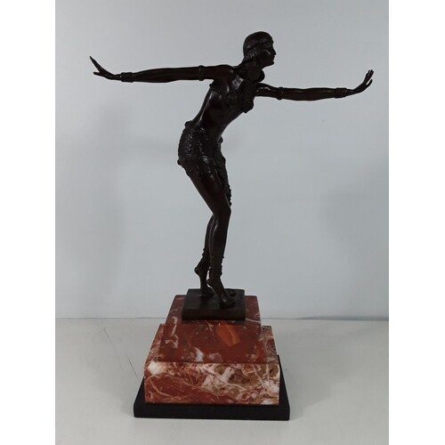 Cast bronze dancing girl on marble base approx 19 inches tal...