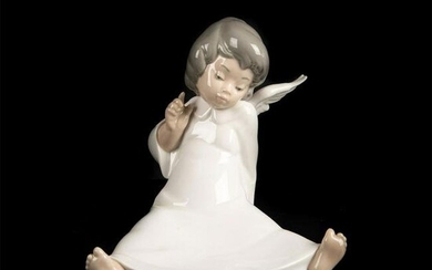 Cherub, Wondering 1004962 - Lladro Porcelain Figurine