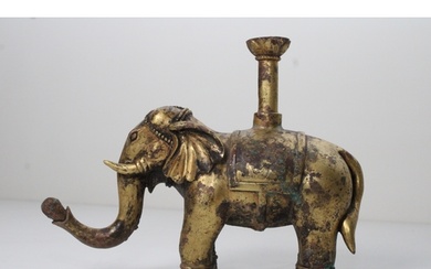 Chinese Bronze Gilt Elephant with Floral Carvings: This capt...