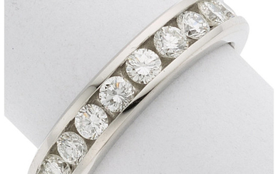 Diamond, Platinum Ring The band features full-cut diamonds weighing...