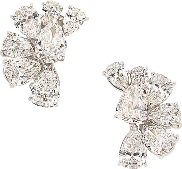Diamond, White Gold Earrings The earrings feature two pear-shaped...