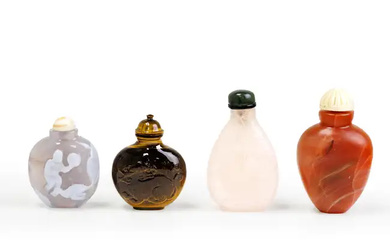 Four Chinese hardstone snuff bottles Late Qing dynasty Comprising: one carnelian agate...
