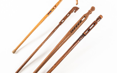 Four "Trapped Ball" Canes or Walking Sticks