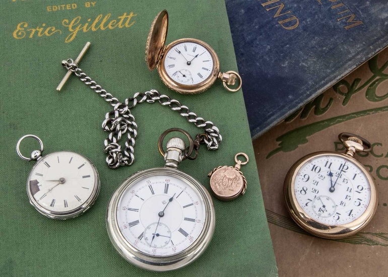 Four pocket watches and a 9ct gold spining fob seal