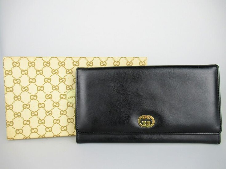 GUCCI Vintage clutch bag in black leather, with box