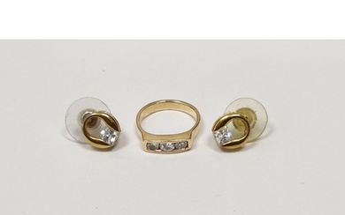 Gold-coloured and diamond three-stone ring, unmarked and a p...