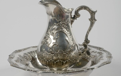 Grande aiguière et son bassin de style Louis XV en argent 950/1000ème au poinçon Delheid....