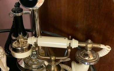 Group of two modern ornate telephones
