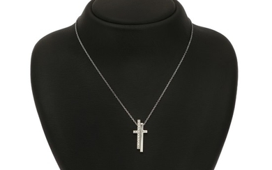 Gucci: A diamond necklace with a pendant in shape of a two-part cross partly set with numerous brilliant-cut diamonds, mounted in 18k white gold.