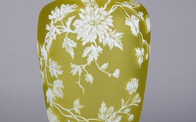 Impressive English cameo glass vase attributed to Thomas Webb, decorated with a crisp white cameo cut floral pattern against a yellow field, stamped with Theodore B Starr, New York retailers mark. Circa 1900. Height 26.5 cm.