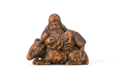JAPANESE WOOD NETSUKE By Isshinsai Masatoshi. In the form of Jurojin seated on a deer while holding a child. Signed. Length 1.5".