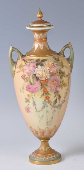 An Edwardian Royal Worcester porcelain blush ivory twin handled pedestal vase and cover