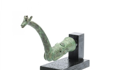 Luristan, a bronze handle of a whetstone in the shape or a representing a deer, ca. 1000 BC.