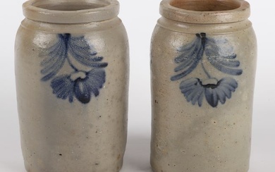 Near pair of blue decorated stoneware jars