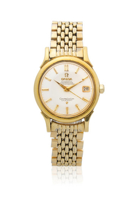 Omega. An 18K gold automatic calendar bracelet watch