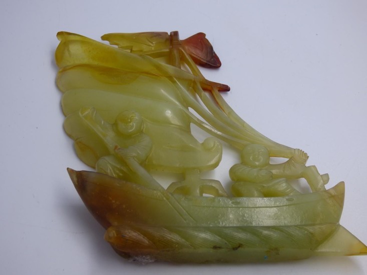Oriental carved jade model of a boat with 2 fishermen 13x11....