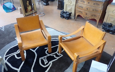 PIERRE CHAPO (1927-1987) Paire de fauteuils modèle SAHARA OU S10 en orme et cuir, édition...