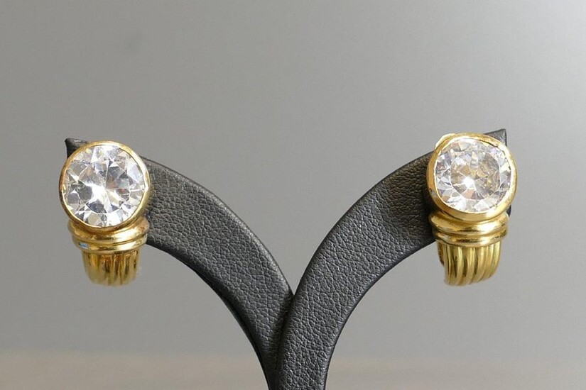 Pair of 18 karat yellow gold ear clips set with rock crystal