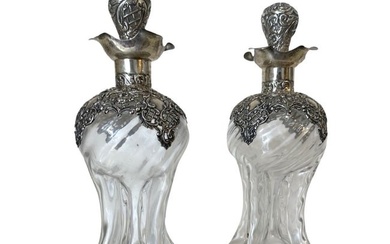 Pair of English Sterling Silver and Cut Glass Bottles