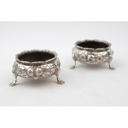 Pair of Mid Victorian Silver Floral ebossed Open salts suppo...