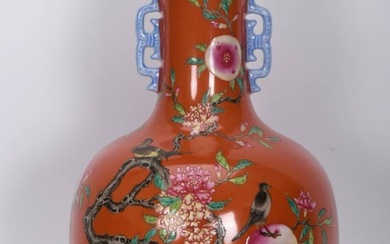 Qing Dynasty, Qianlong period, enameled coral red flower and bird double-eared vase