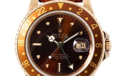 ROLEX Vintage GMT-Master "Tigerauge" mit Nipple-dial, Ref. 16758. Herren Armbanduhr aus ca. 1983.