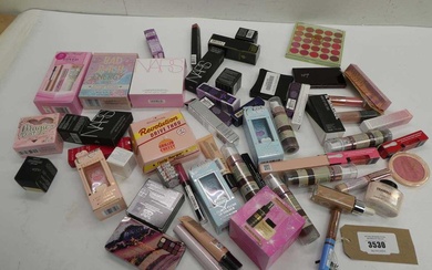 Selection of branded cosmetics including NARS, MAC, Clarins, No. 7,...