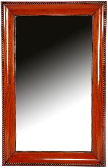 (-), Mirror in mahogany veneer frame and pearl...