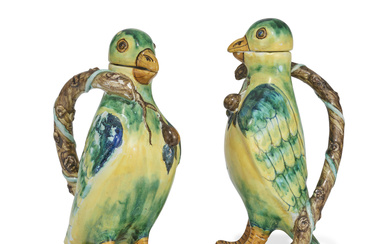 TWO GLEINITZ OR PROSKAU FAYENCE PARROT JUGS AND COVERS CIRCA 1770-80