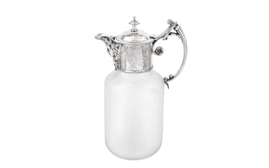 AMENEDED DESCRIPTION: TWO SILVER MOUNTED GLASS CLARET JUGS