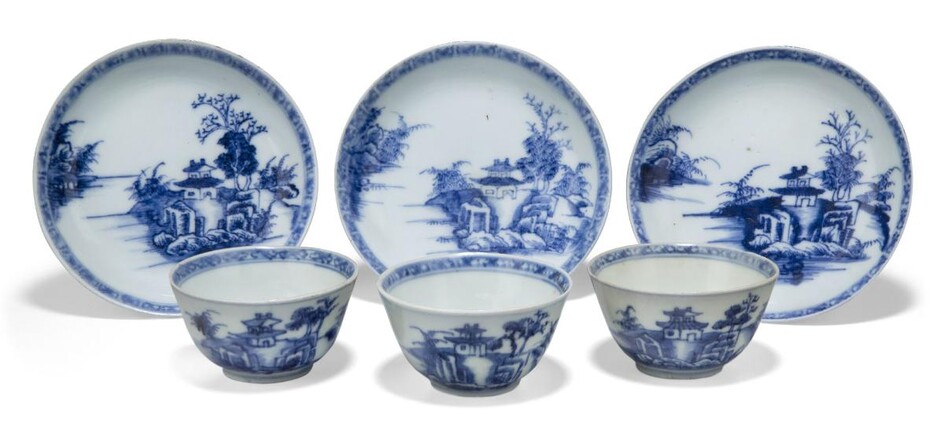 Three pairs of Chinese porcelain blue and white 'pagoda' teabowls and saucers excavated from the Nanking Cargo, 18th century, each painted with a pagoda on an island, 6.3cm-10.1cm diameter (6) Provenance: With Christie's Nanking Cargo paper labels...