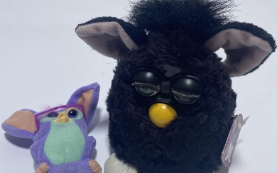 Two toys marked Furby (1998)