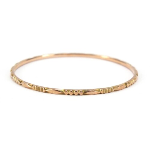 Unmarked gold bangle, (tests as 9ct gold) 6.5cm in diameter,...
