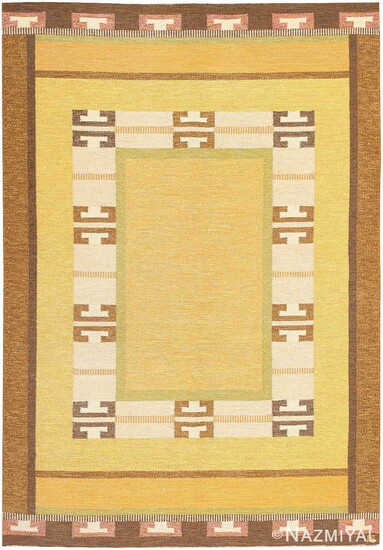 VINTAGE SWEDISH FLATWOVEN CARPET DESIGNED BY INGEGERD SILOW, SIGNED 'IS'. 9 ft 2 in x 6 ft 5 in (2.79 m x 1.96 m).