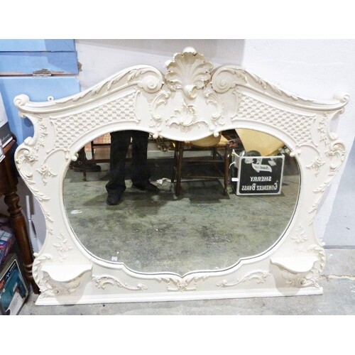 Victorian over-mantel mirror, the shaped glass in moulded an...