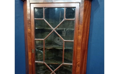 Walnut veneered hanging corner cabinet with astral glazed do...